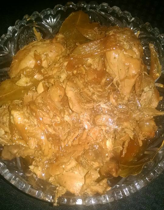 chicken adobo recipe in glass bowl