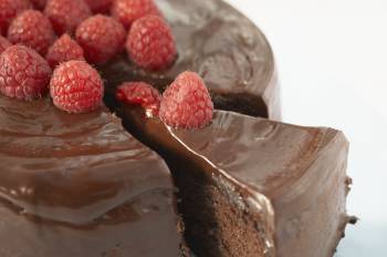 Chocolate caked topped with strawberries