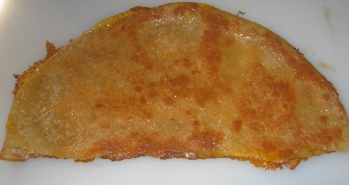 Cooked quesadilla before cutting
