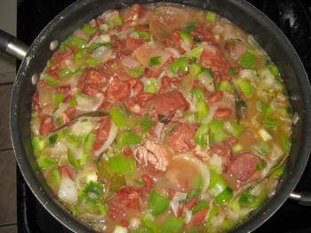 Red beans and rice cooking in a pan