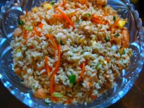 Glass bowl full of fried rice
