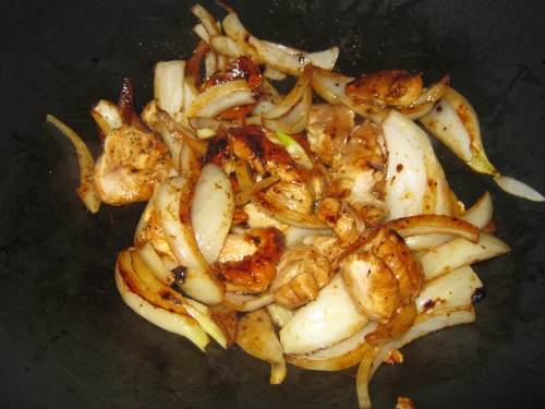onions, black pepper and Tamari Soy Sauce cooking